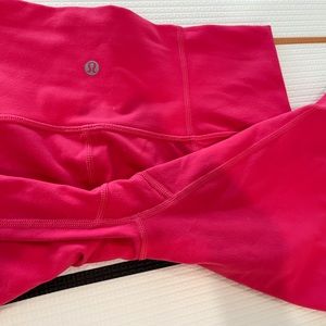 Hot pink Lululemon bike shorts high rise. Unknown what size, likely 8 EUC